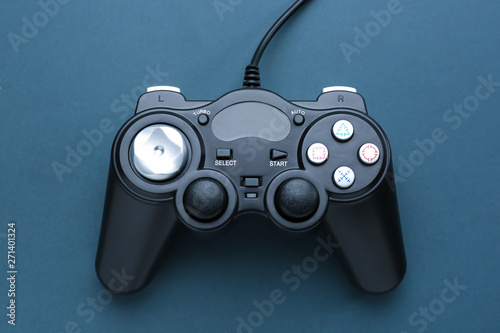 Modern game pad on grey background