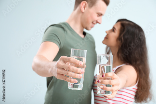 Young couple with glasses o...