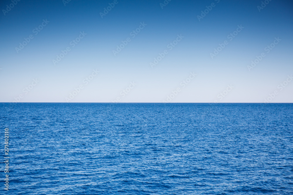 Red blue sea and light blue sky Red blue sea and light blue sky
