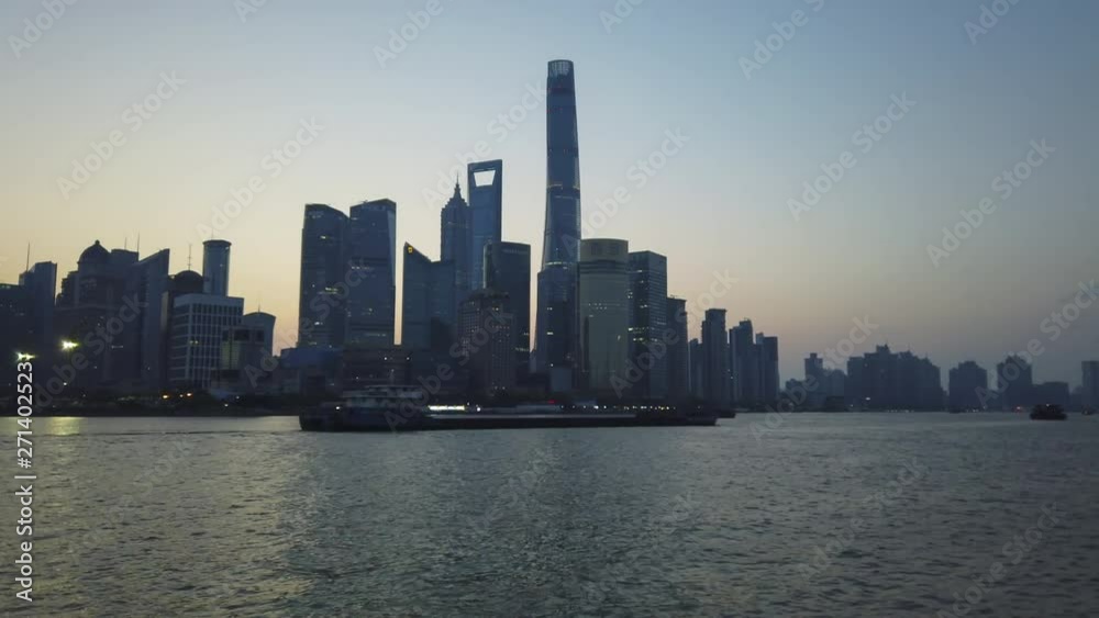 Shanghai CBD 4k timelapse with panning camera movement in morning sunrise, lujiazui distinct with Huangpu river scene, Pudong, Shanghai, China Shanghai CBD 4k timelapse with panning camera movement in morning sunrise, lujiazui distinct with Huangpu river scene, Pudong, Shanghai, China