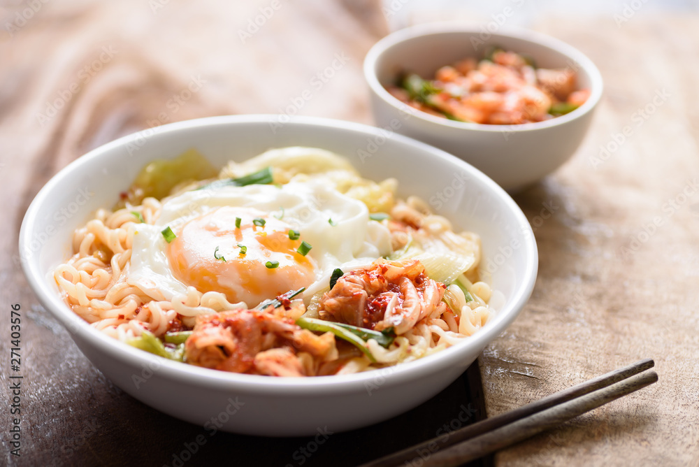 Kimchi noodle spicy soup with egg and vegetables, Korean food Kimchi noodle spicy soup with egg and vegetables, Korean food