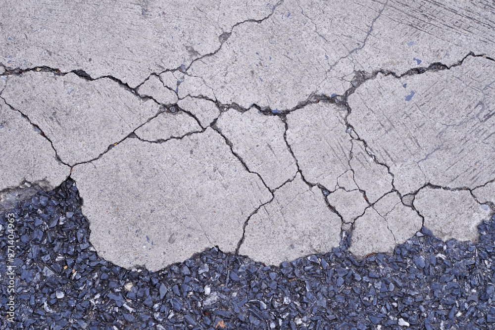 Fototapeta premium Cracked concrete texture closeup background