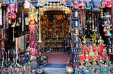 Colorful carved wooden masks are sold on the traditional flea market in Thamel, Kathmandu, Nepal