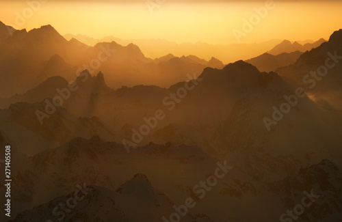 Sunrise in the mountains landscape. Beautiful landscape with high mountains