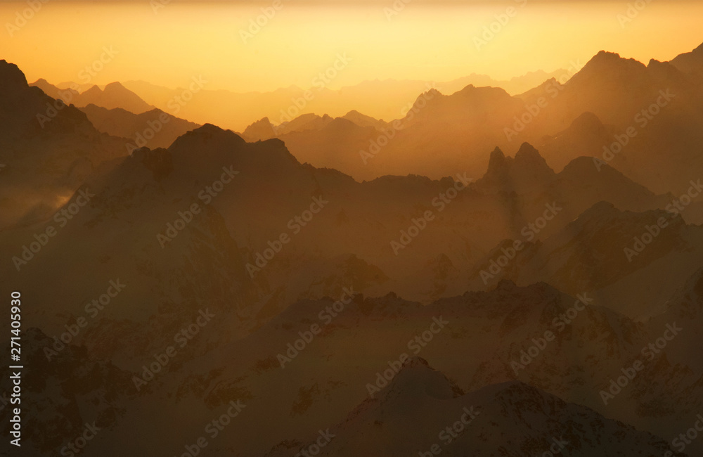 Sunrise in the mountains landscape. Beautiful landscape with high mountains