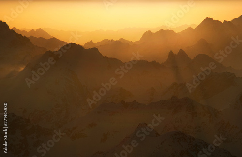 Sunrise in the mountains landscape. Beautiful landscape with high mountains