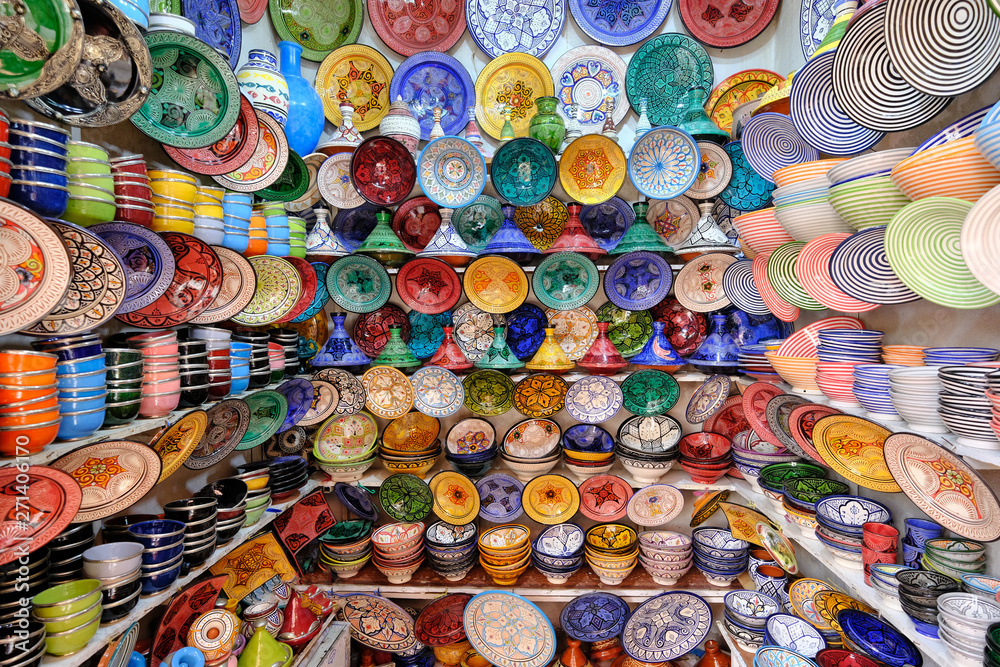 Colorful crafts shop with ceramic art on a traditional moroccan market in medina of Marrakech, Morocco in Africa