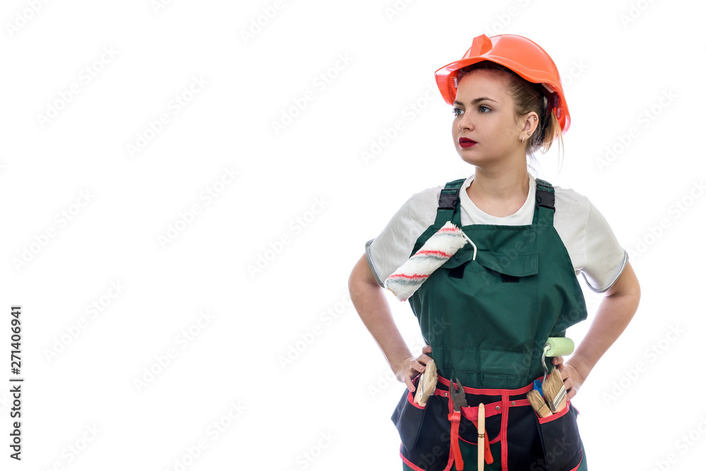 Young woman in helmet holding roller isolated on white Young woman in helmet holding roller isolated on white