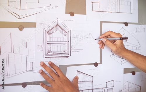 Architect Designer Engineer sketching drawing draft working Perspective Sketch design house construction Project
