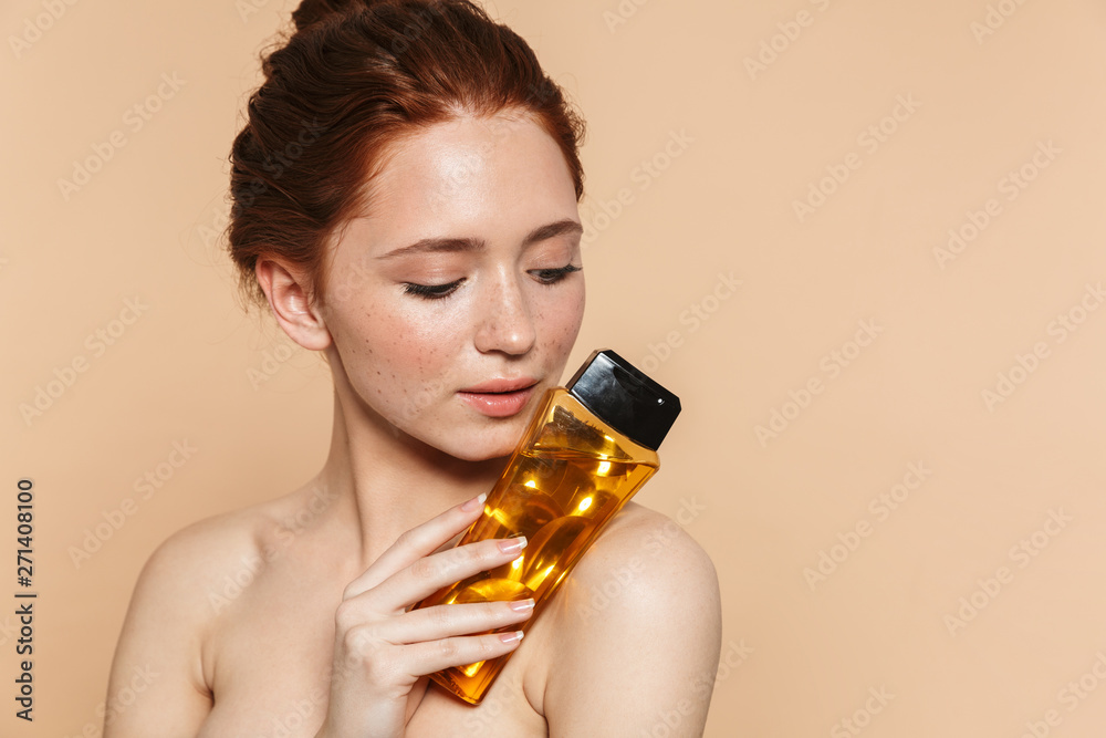 Fototapeta premium Beauty portrait of an attractive young topless redhead woman