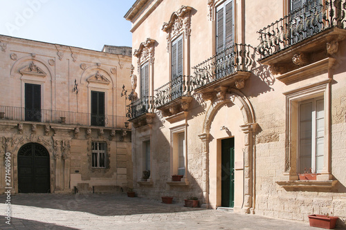 Falconieri typical square with its baroque palaces in Lecce, Italy © Laura