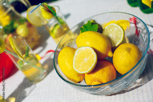 bowl with lemons and mint for lemonade