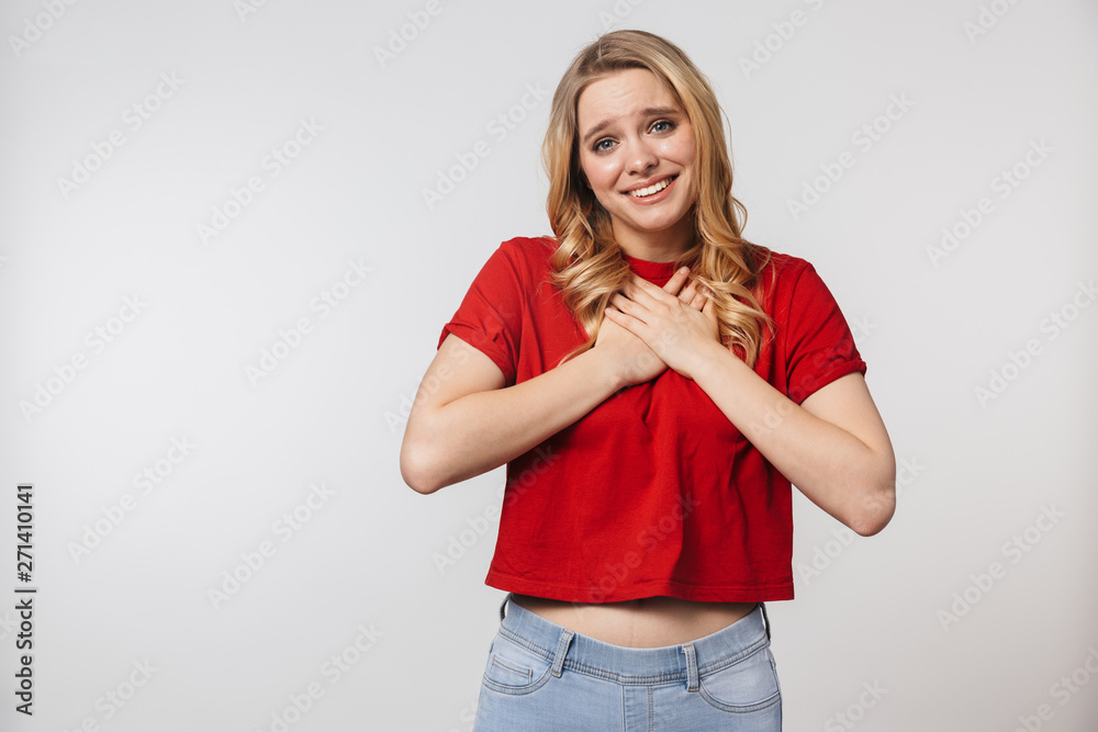 Excited young pretty beautiful woman posing isolated over white wall background. Excited young pretty beautiful woman posing isolated over white wall background.