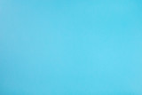 Blue, turquoise background with high resolution. Top view. Copy space.