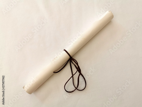 Quadro em tela Parchment scroll vellum on a table
