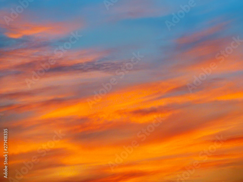 Bright colorful sky on evening sunset. Amazing blue, purple colorful sky on a lake surface at sundown. Beautiful natural abstract background. © mivod