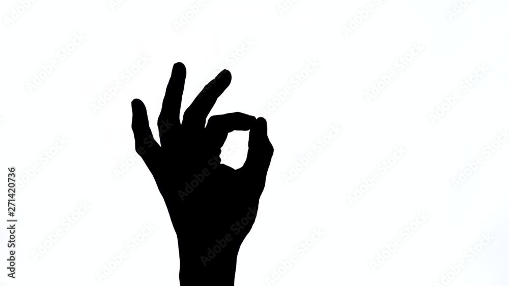 Male hand pointing up okay, yes, accepting hand sign, studio, isolated. Black and white contrast shot Male hand pointing up okay, yes, accepting hand sign, studio, isolated. Black and white contrast shot