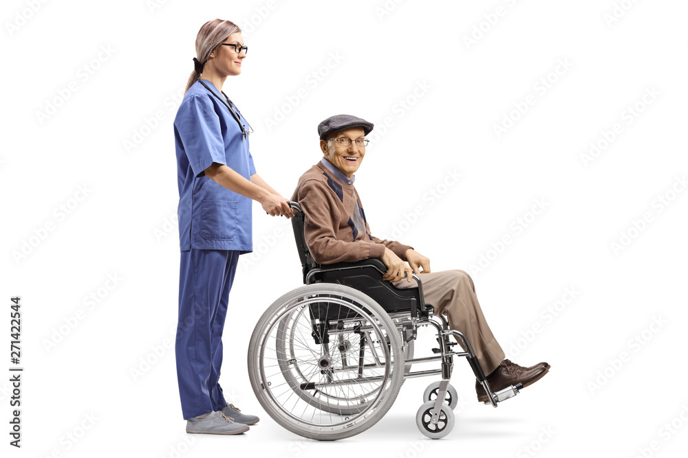 Nurse pushing a senior man sitting in a wheelchair Nurse pushing a senior man sitting in a wheelchair