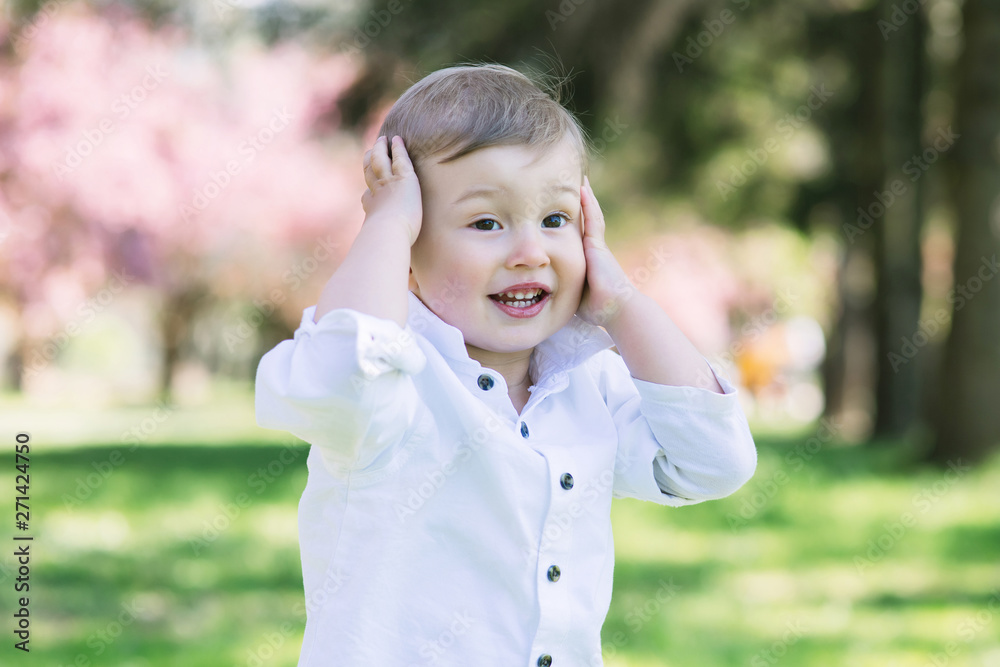 Portrait of a happy little boy in the park Portrait of a happy little boy in the park