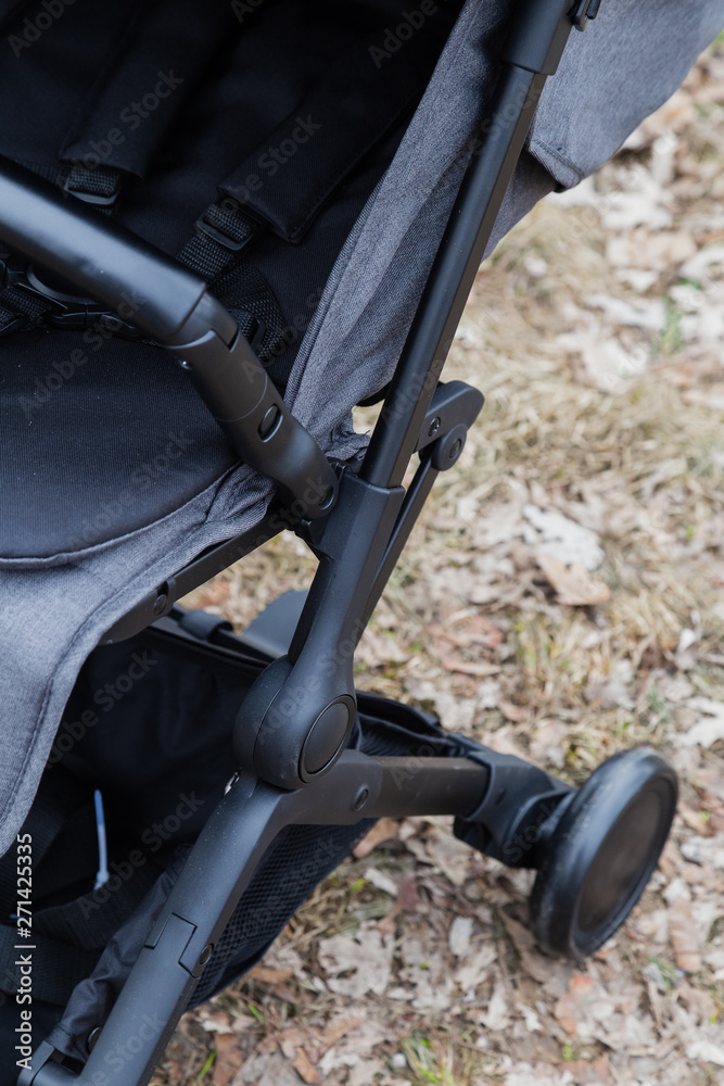 Original baby stroller, close-up details. New design. Original baby stroller, close-up details. New design.