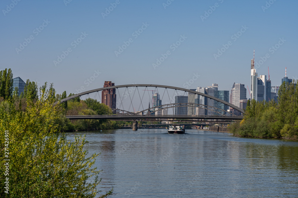 view on main river and frankfurt skyline from littoral, frankfurt, hesse, germany