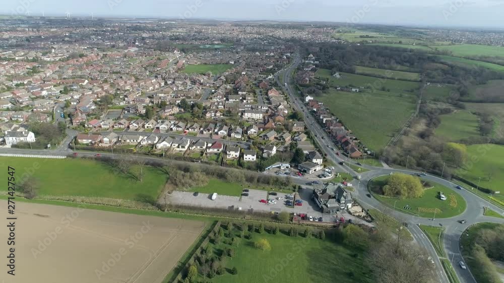 Aerial Drone pull away from houses in northern village, Leeds, UK Aerial Drone pull away from houses in northern village, Leeds, UK