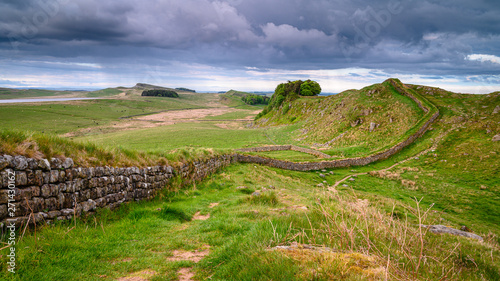 Rain Clouds over Hadrian s Wall  a UNESCO World Heritage Site in the beautiful Northumberland National Park. popular with walkers along the Hadrian s Wall Path and Pennine Way