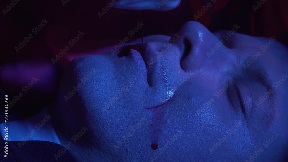 Close up of a the face of a dead man, some blood pouring on his lips, 4k Close up of a the face of a dead man, some blood pouring on his lips, 4k