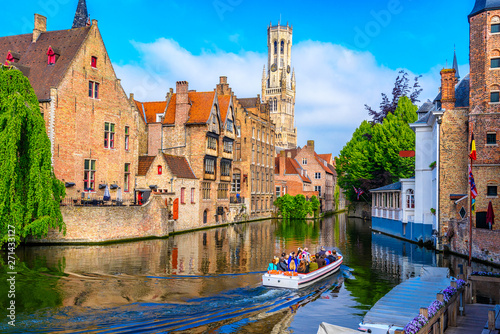 Classic view of the historic city center with canal in Brugge, West Flanders province, Belgium. Cityscape of Brugge.