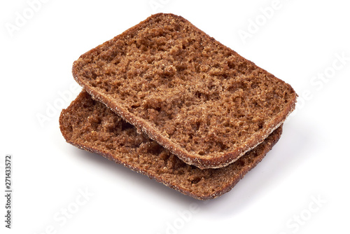 Slices of rye bread, crust, close-up, isolated on white background photo