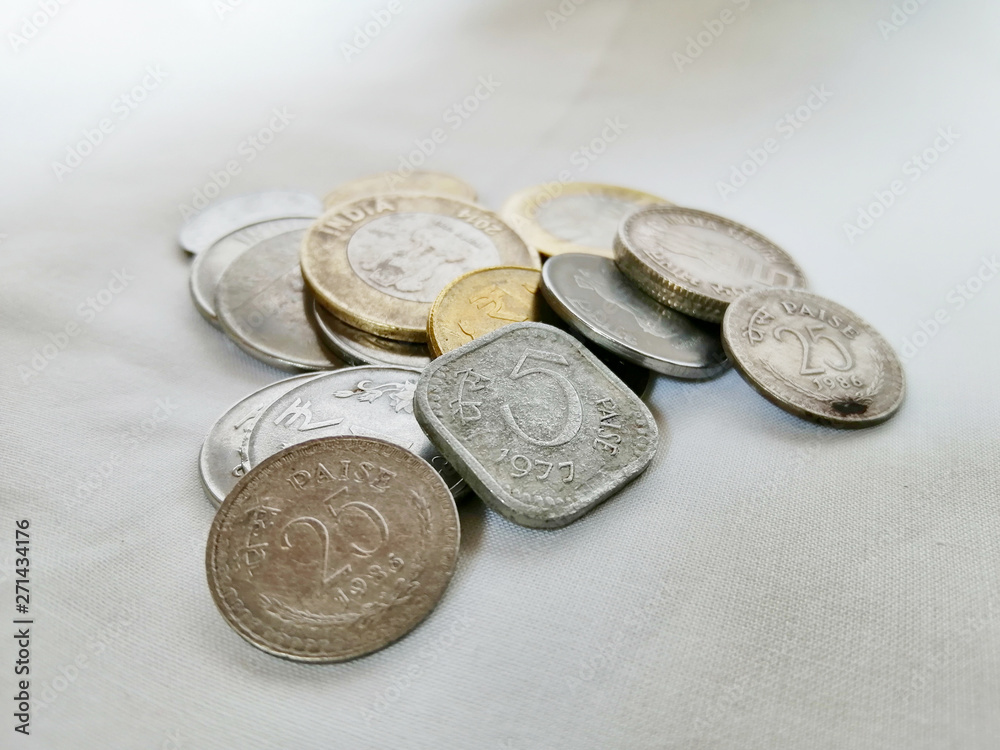 Indian currency two thousand one hundred rupee note and coins
