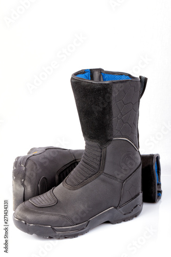 Detail of a pair of motorcycle boots isolated