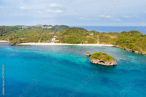 Ilig Iligan Beach. White sand beach and clear coral lagoon. Coast of the island of Boracay, Philippines, top view. photo