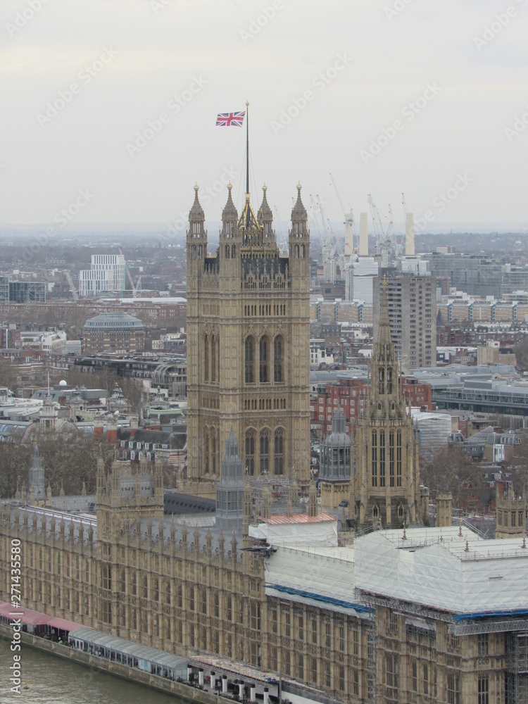 View of the Palace of Westminster from the top of the London Eye on a cloudy day 