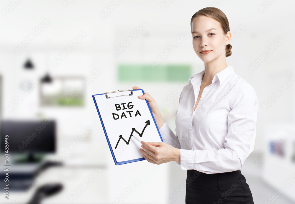 Business, technology, internet and networking concept. Young entrepreneur showing keyword: Big data Business, technology, internet and networking concept. Young entrepreneur showing keyword: Big data