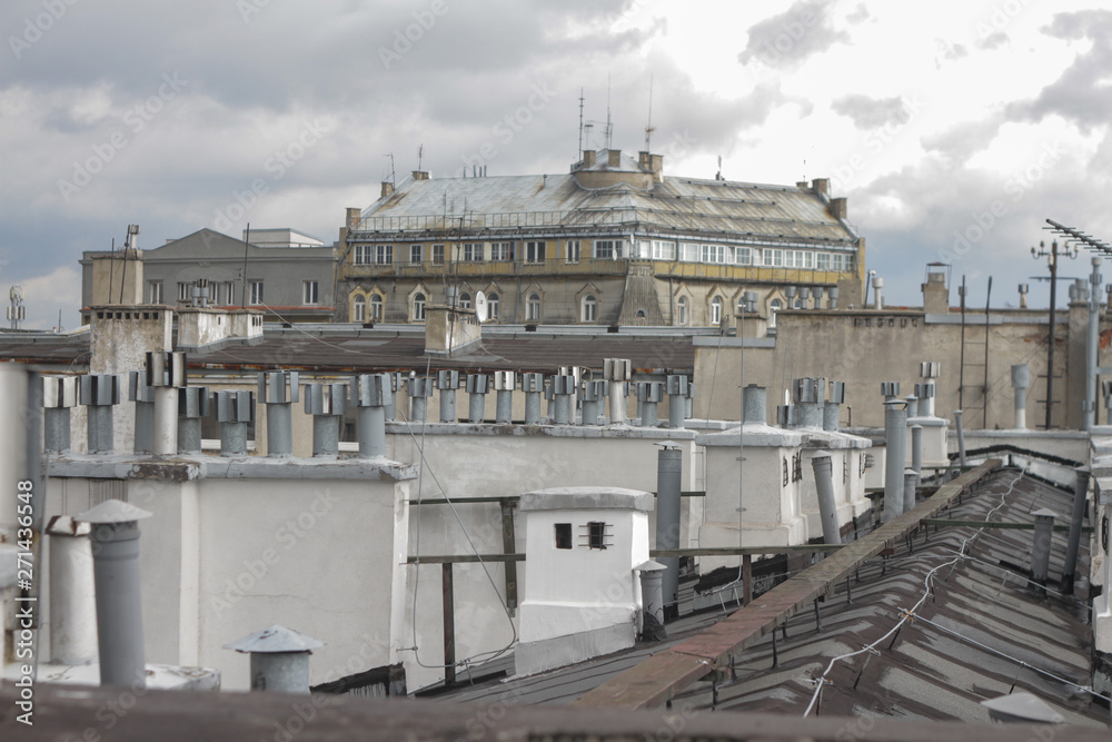 Fototapeta premium Roofs of tenements in the city center.