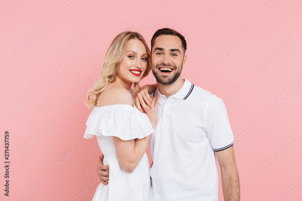 Happy beautiful couple standing isolated Happy beautiful couple standing isolated