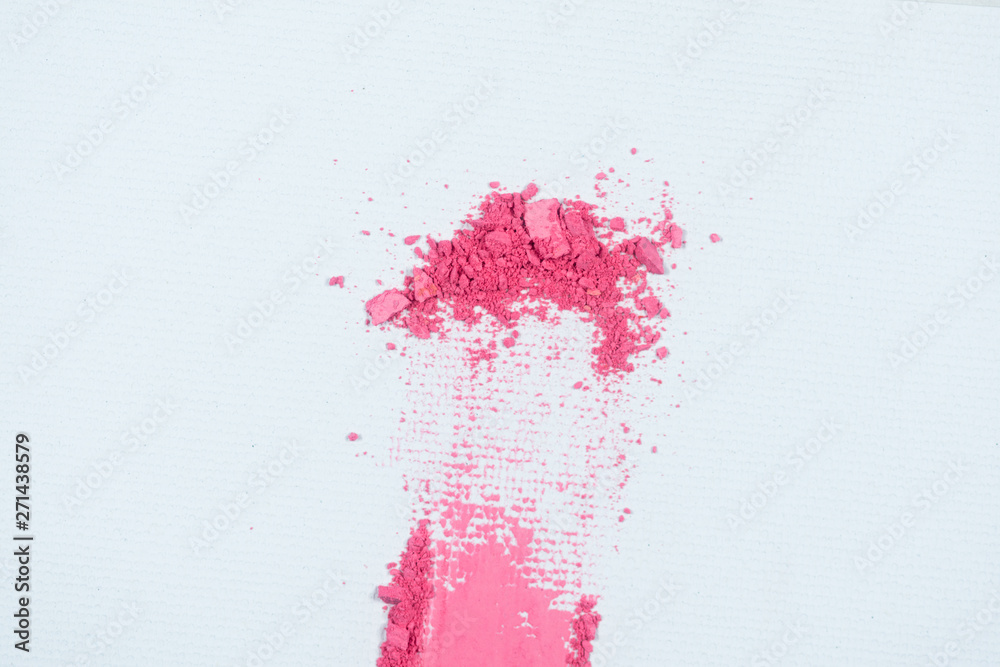 Eye shadow or bronzer pink smudge on white background.