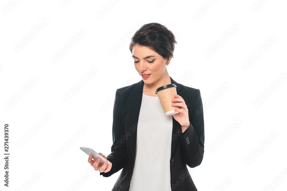 beautiful mixed race businesswoman using smartphone and drinking coffee from disposable cup isolated on white beautiful mixed race businesswoman using smartphone and drinking coffee from disposable cup isolated on white
