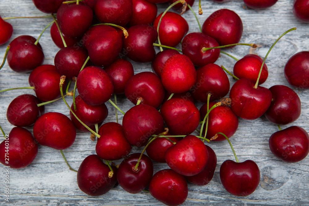 cherry on a wooden background close-up cherry on a wooden background close-up