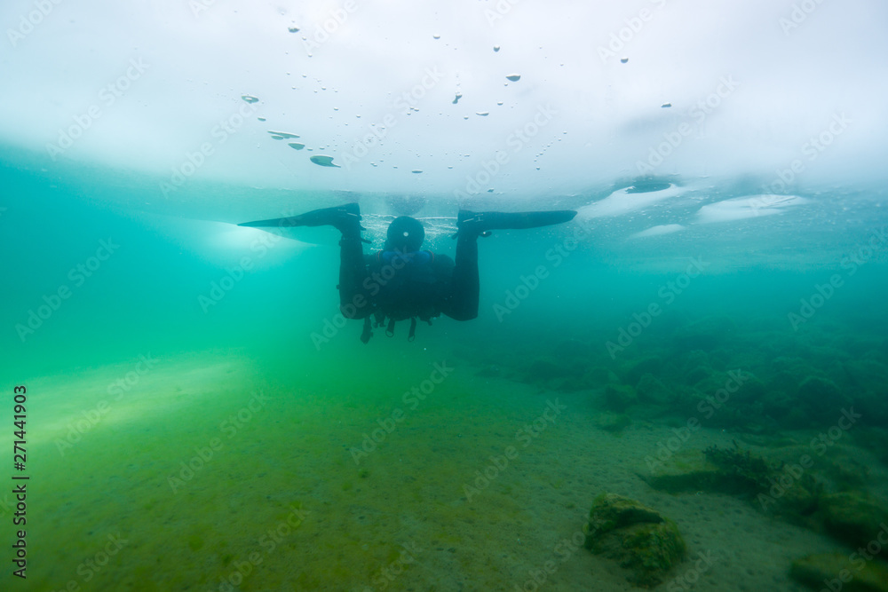 Fototapeta premium Ice Diving Lake Baikal, Siberia Russia