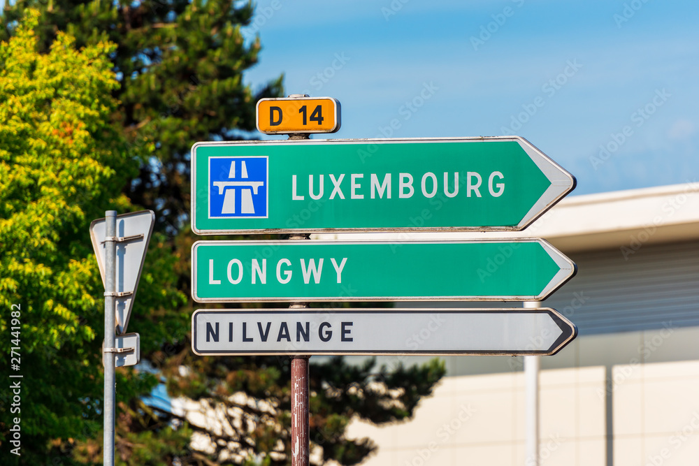 Directional Sign to Luxembourg in Thionville, Northern France. Thionville is a city with about 41,000 inhabitants located 10 km south of Luxembourg.