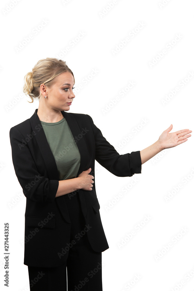 friendly young woman pointing to his side and looking into the camera. isolated on white background friendly young woman pointing to his side and looking into the camera. isolated on white background