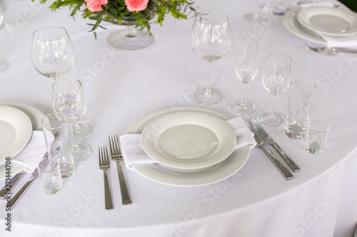 Table setting in the restaurant. Preparing for the Banquet Selective focus. © stock28studio