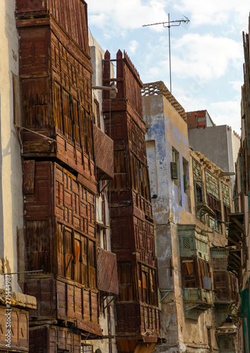 Old houses with wooden mashrabiyas in al-Balad quarter, Mecca province, Jeddah, Saudi Arabia photo