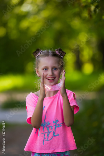 Girl Playing Homemade Toy Called Slime, Kid having fun and being creative by science experiment.