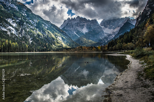 Beautiful alpine countryside. Scenic image of famous Sassolungo peak with overcast perfect blue sky. Wonderful Vall Gardena under sunlight. Majestic Dolomites Mountains. Amazing nature Landscape