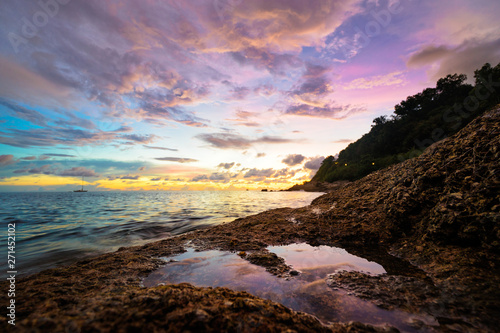 Beautiful landscape with colorful sunset on the sea.