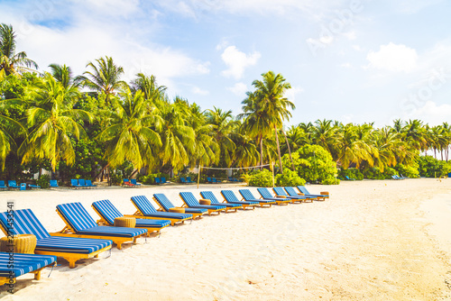 Fototapeta Naklejka Na Ścianę i Meble -  beach chair with tropical Maldives island  beach and sea
