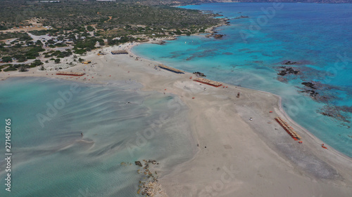 Aerial drone panoramic view photo of famous exotic paradise sandy deep turquoise beach of Elafonissi in South West Crete island, Greece